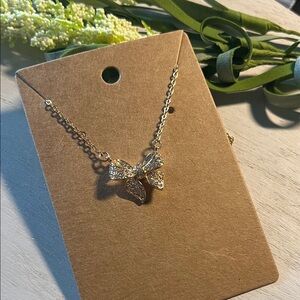 Bow necklace gold